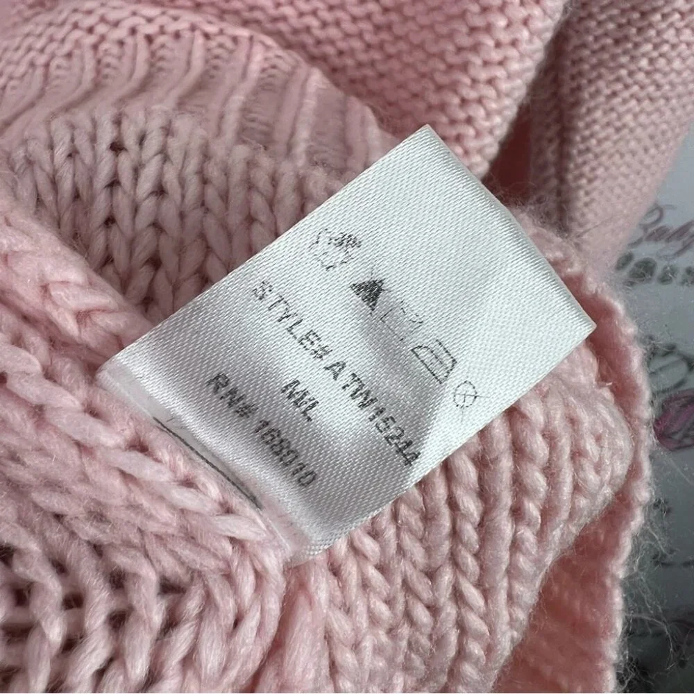 And the why sweater knit knitted Elegant Pink and Cream Turtleneck Sweater